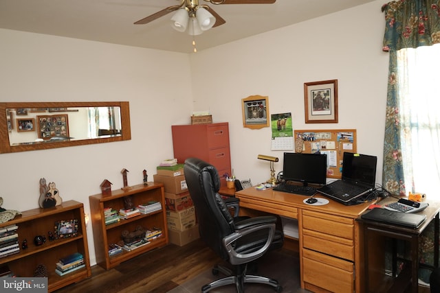 office with dark wood-type flooring and ceiling fan