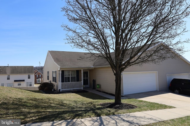 single story home featuring a front yard, a garage, and driveway