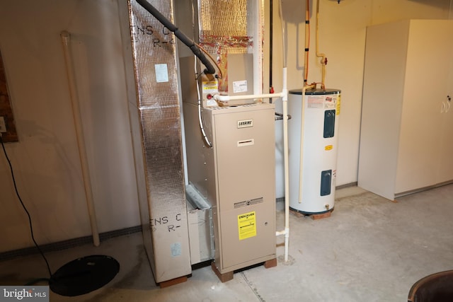 utility room with electric water heater