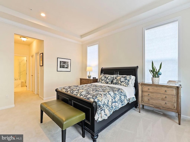 bedroom featuring multiple windows, baseboards, and light carpet