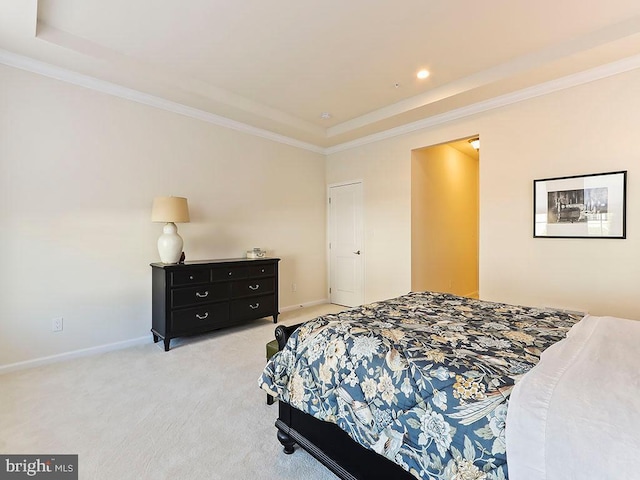 bedroom with light colored carpet, crown molding, and baseboards