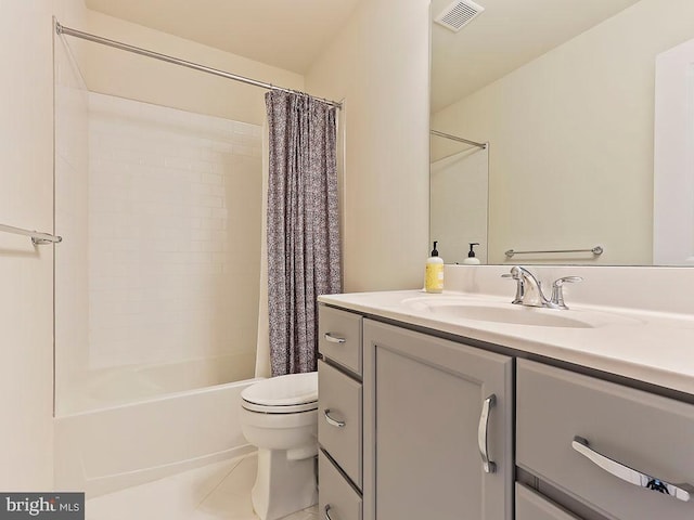 bathroom featuring visible vents, toilet, tile patterned floors, shower / bath combination with curtain, and vanity