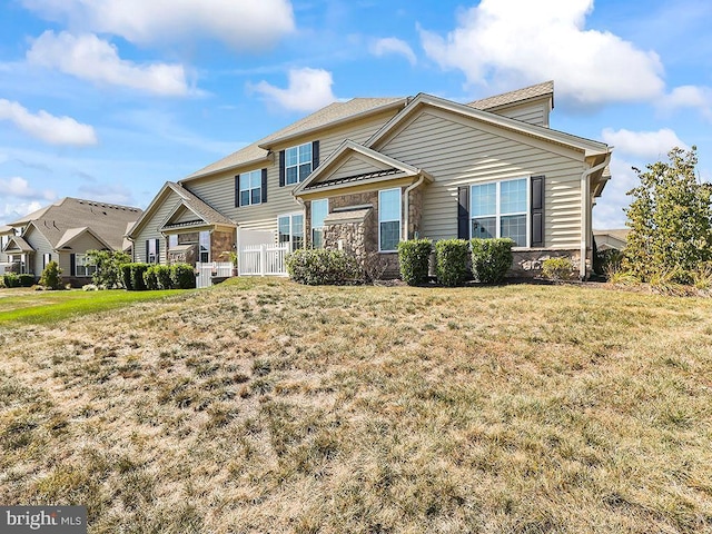 view of front of home with a front lawn