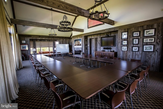 bar with beam ceiling, carpet, wood walls, and a chandelier