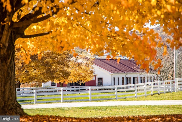 exterior space with a yard and a fenced front yard