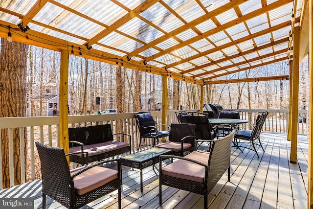 deck featuring outdoor lounge area