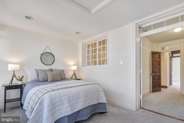 bedroom featuring carpet flooring and baseboards