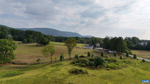 mountain view featuring a rural view