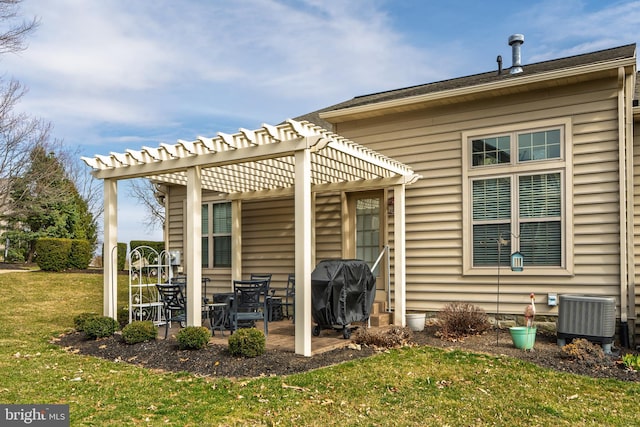 back of house featuring a patio area, cooling unit, a lawn, and a pergola