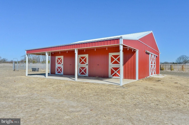 view of outdoor structure featuring an outbuilding and an exterior structure