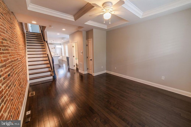 unfurnished room with stairway, coffered ceiling, baseboards, and dark wood-style flooring