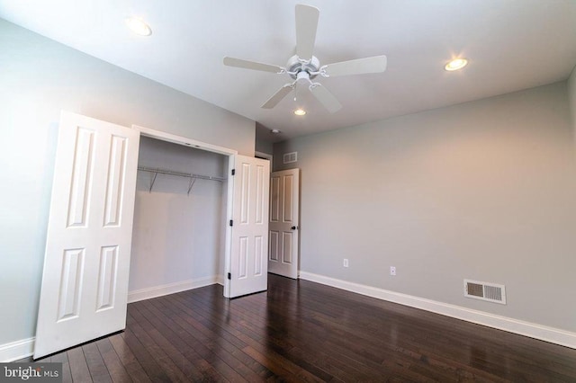 unfurnished bedroom with dark wood finished floors, recessed lighting, visible vents, and baseboards