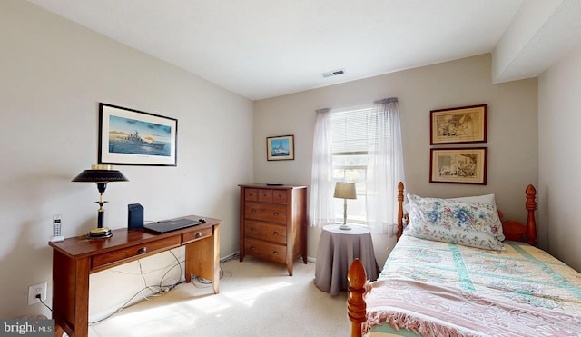 bedroom with light carpet and visible vents