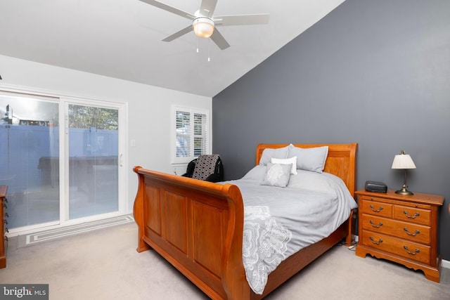 bedroom featuring ceiling fan, lofted ceiling, light colored carpet, and access to exterior