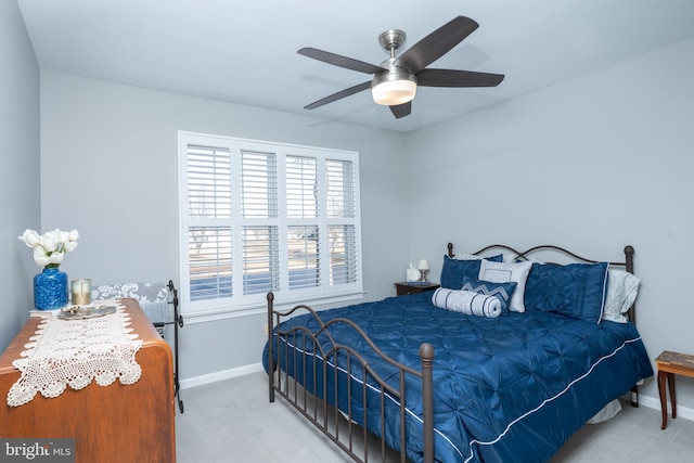 bedroom featuring carpet flooring, baseboards, and ceiling fan