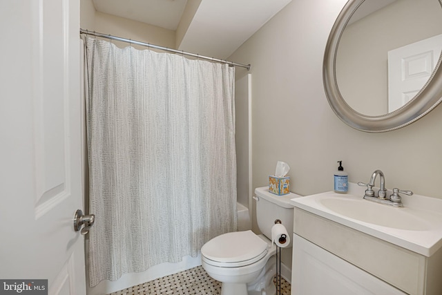 full bath with vanity, toilet, and shower / tub combo with curtain