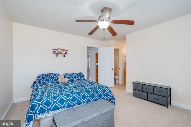 bedroom featuring baseboards, light carpet, and ceiling fan