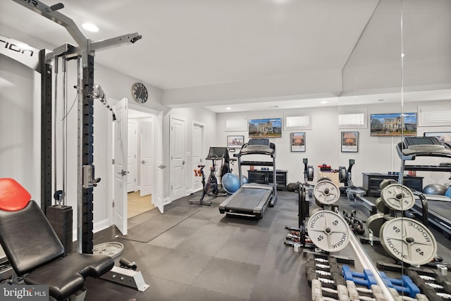 workout area featuring recessed lighting