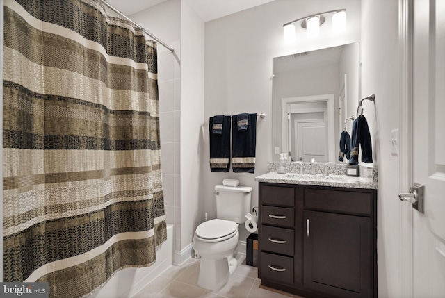 full bath featuring baseboards, toilet, shower / bath combo, tile patterned floors, and vanity