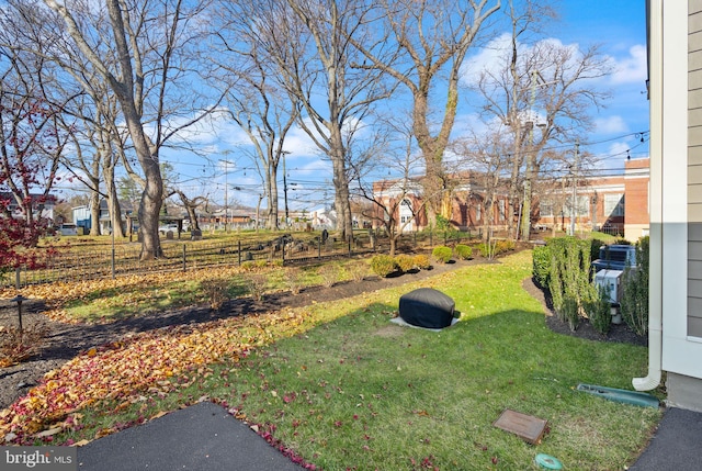 view of yard featuring fence