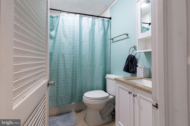 full bathroom featuring tile patterned floors, toilet, vanity, and shower / tub combo