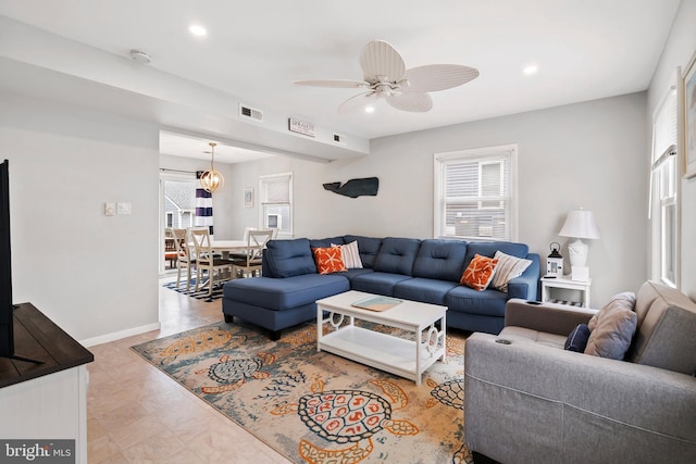 living room with visible vents, recessed lighting, baseboards, and ceiling fan