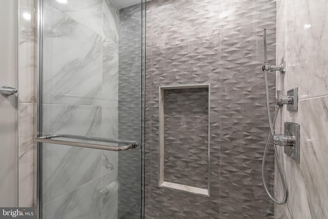 full bathroom with a shower stall