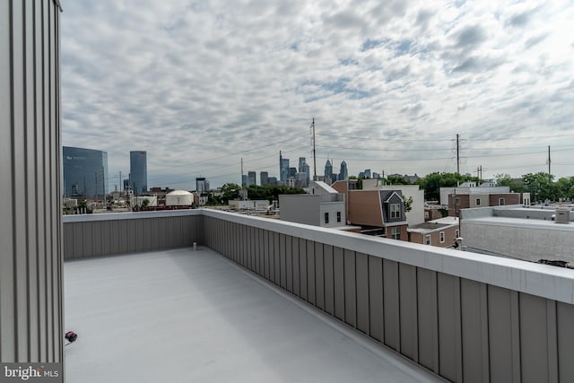 balcony featuring a city view