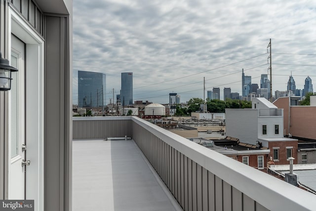 balcony featuring a view of city