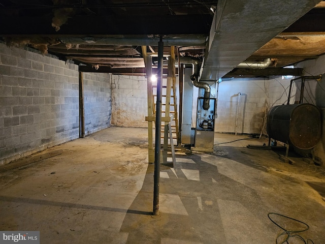 unfinished basement with heating fuel