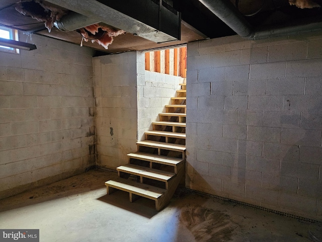 basement featuring stairway