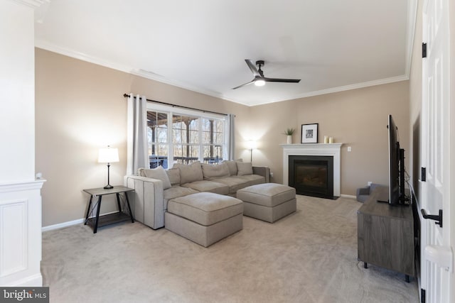 living room with crown molding, a fireplace with flush hearth, and light carpet