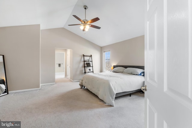 bedroom with baseboards, light carpet, lofted ceiling, and a ceiling fan