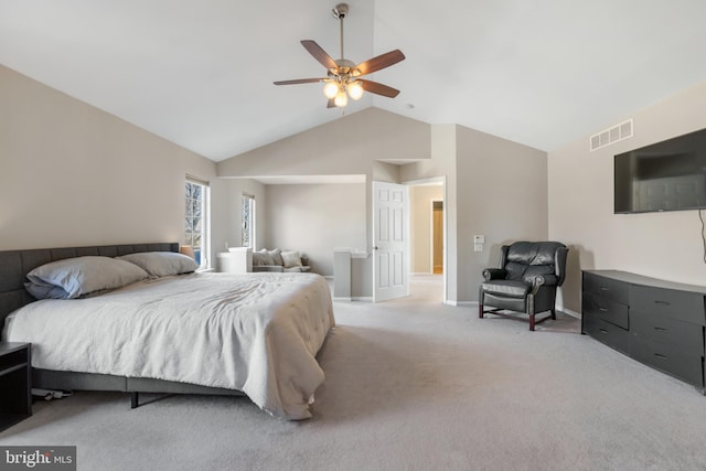 bedroom with baseboards, visible vents, lofted ceiling, ceiling fan, and light colored carpet