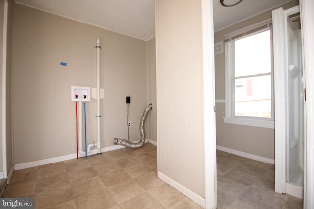 laundry room with laundry area, hookup for a washing machine, and baseboards