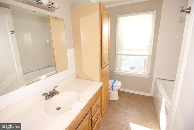 full bath featuring toilet, crown molding, tile patterned flooring, baseboards, and vanity