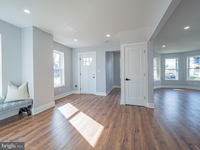 entryway featuring visible vents, recessed lighting, wood finished floors, and baseboards