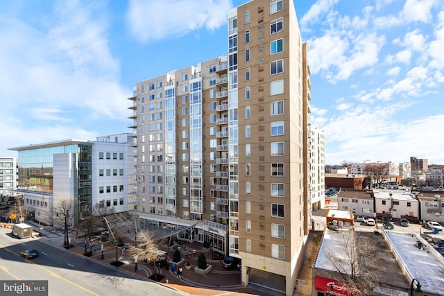 view of building exterior with a city view