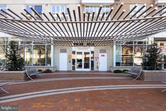 property entrance with brick siding