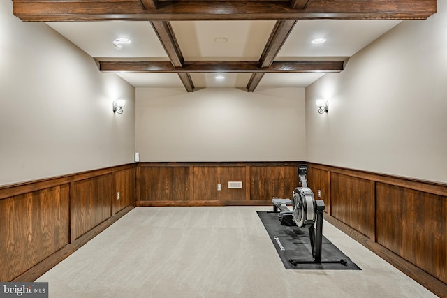 workout room featuring recessed lighting, wainscoting, coffered ceiling, and light colored carpet