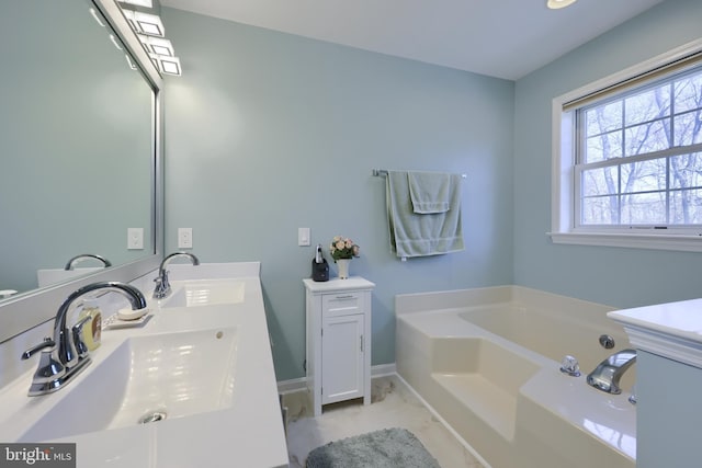 full bath featuring double vanity, a garden tub, and a sink