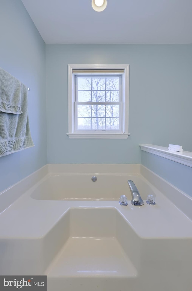 bathroom featuring a bath