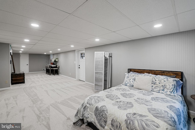 bedroom with recessed lighting, a drop ceiling, baseboards, and carpet