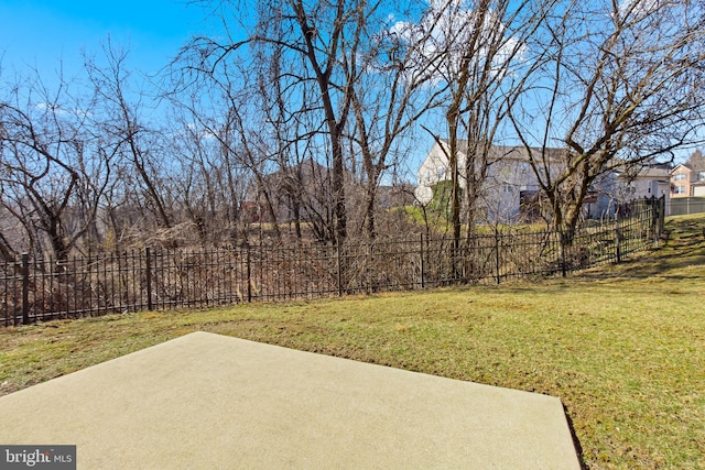 view of yard featuring a patio and fence