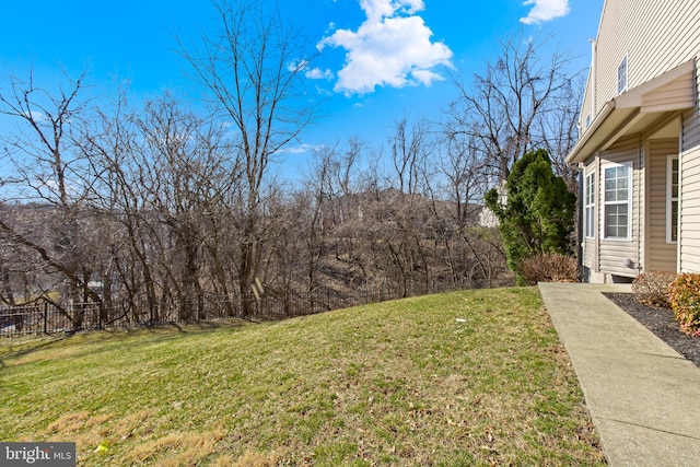 view of yard with fence