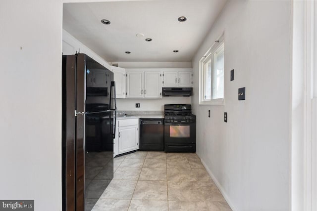 kitchen with black appliances, under cabinet range hood, white cabinets, light countertops, and baseboards