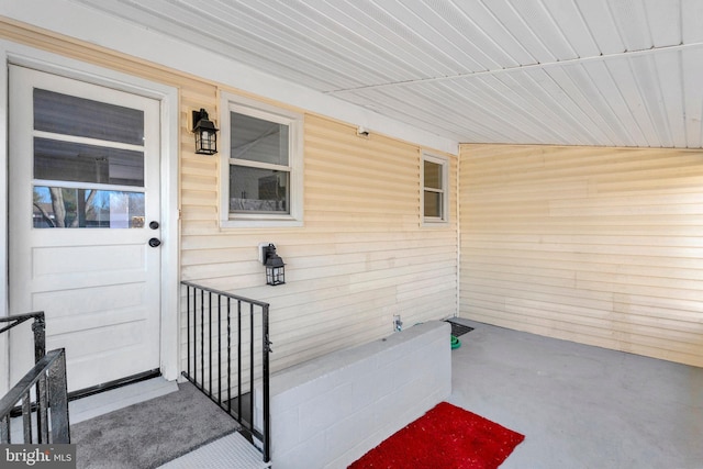 doorway to property featuring a porch