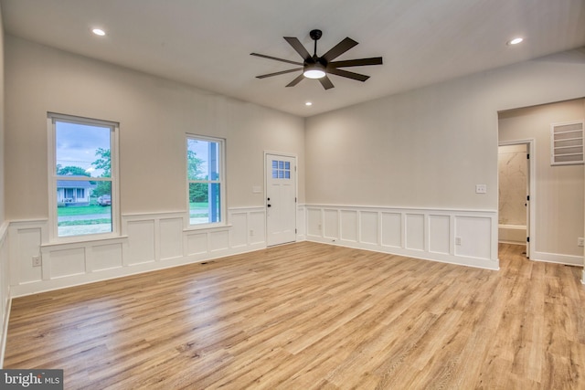 unfurnished room with visible vents, recessed lighting, light wood-type flooring, and ceiling fan