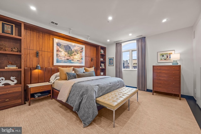 bedroom with recessed lighting, visible vents, baseboards, and light colored carpet