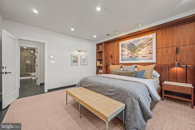 bedroom featuring visible vents, recessed lighting, ensuite bathroom, and baseboards